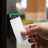 Presenting an access card at a reader